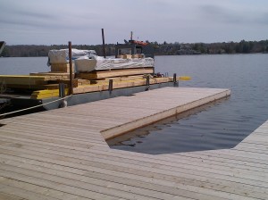 Full load of materials for 3 slip boathouse on Wicks Construction Ltd barge - in Gravenhurst